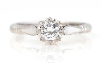 A diamond solitaire ring set with a brilliant-cut diamond, mounted in 18k...