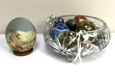 A glass bowl, containing a group of assorted novelty eggs, and other decorative glass items