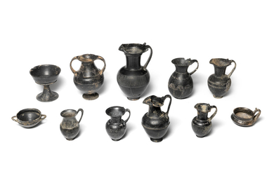 A group of eleven Etruscan bucchero ware vessels