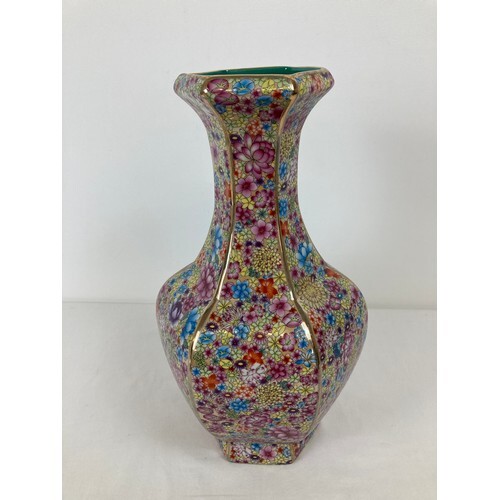 A large Chinese ceramic hexagonal shaped vase with chintz de...