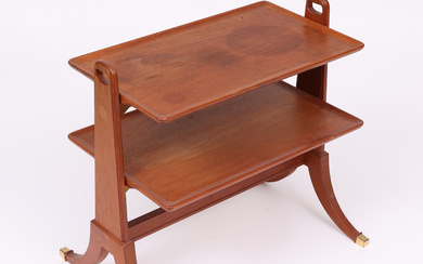 A mid-20th century solid teak side table.