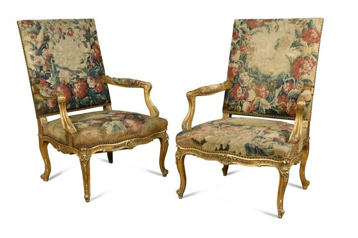 A pair of 20th century French gilt framed fauteuil