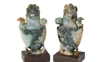 A pair of Chinese carved hardstone lidded vases