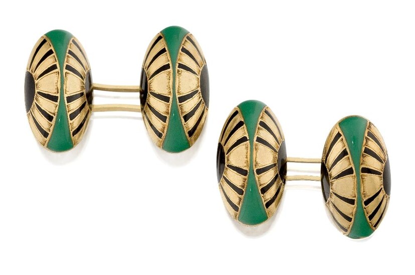 A pair of French Art Nouveau gold and enamel cufflinks, each designed as oval domed panels with black enamel demi-flowerhead twin motifs with turquoise coloured enamel triangular shaped terminals, to single clip connecting links, French assay...