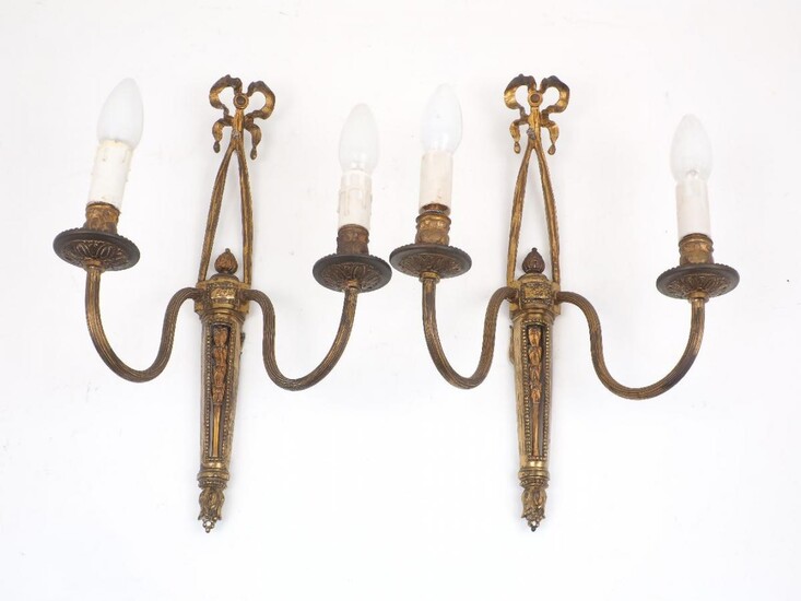A pair of French gilt bronze two branch wall lights,...