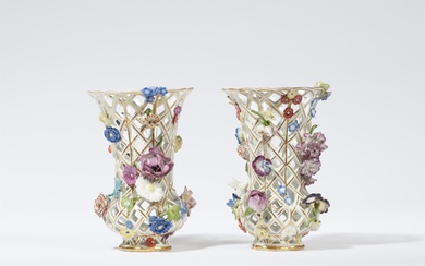 A pair of Meissen porcelain vases with floral appliques