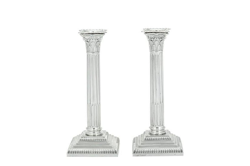 A pair of Victorian sterling silver candlesticks