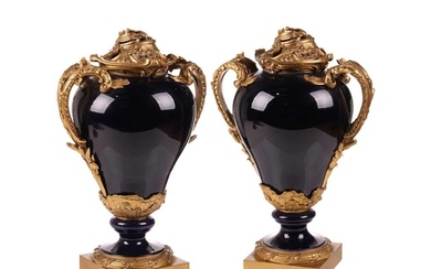 A pair of large French 19th-century porcelain and ormolu mou...