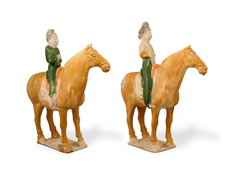 A pair of sancai-glazed pottery horses and riders