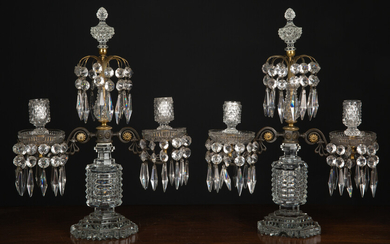 A pair of two branch cut glass Regency-style candelabras