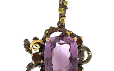 A pendant set with an amethyst, three garnets and three chrome diopsides, mounted in black rhodium plated and partly gilded sterling silver.