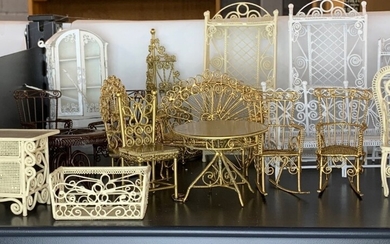 A quantity of dolls house painted metal conservatory furniture.