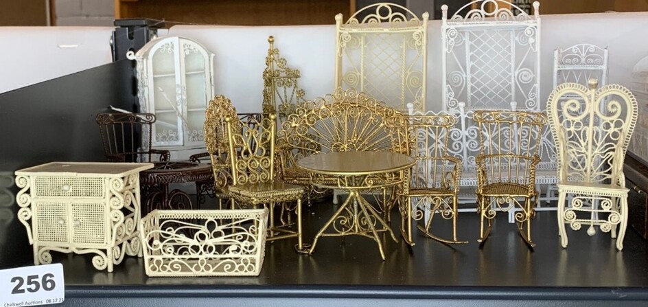 A quantity of dolls house painted metal conservatory furniture.