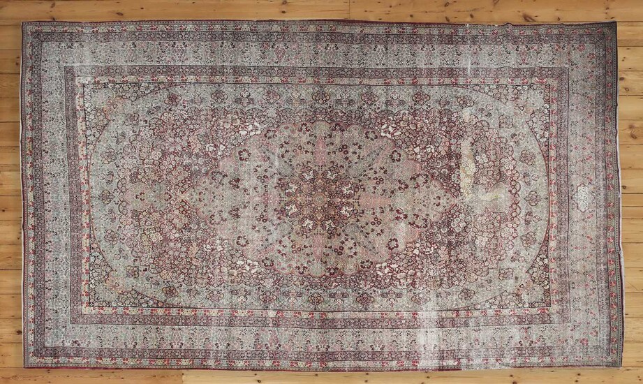 A rare antique Persian Laver carpet