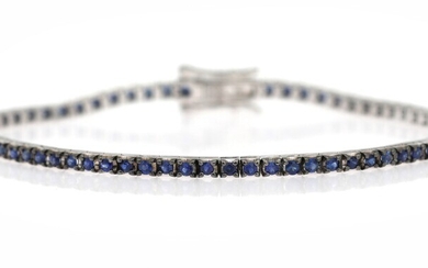 NOT SOLD. A sapphire bracelet set with numerous circular-cut sapphires weighing a total of app....