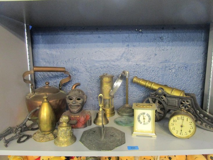A selection of metalware to include a brass and iron model c...