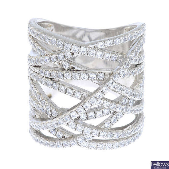 A selection of silver and white metal rings.
