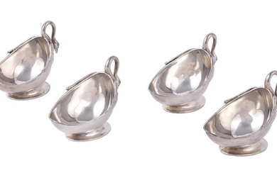 A set of four silver oval salts by Goldsmiths & Silversmiths Co. Ltd.