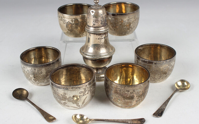 A set of six Victorian silver circular salts, each engraved with foliate stems, together with three