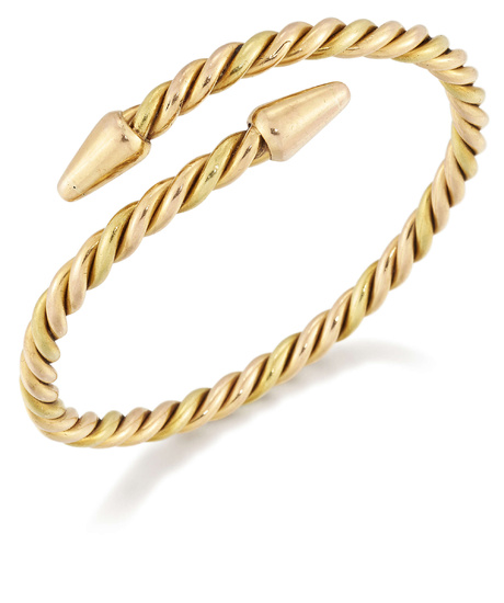 A two tone twist bangle, designed with with rounded conical...