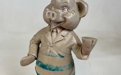 A vintage resin butcher's advertising pig, height 47cm.A vintage resin...