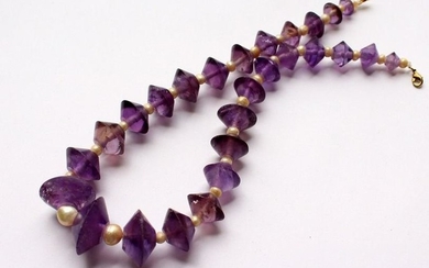 AN AMETHYST AND PEARL NECKLACE, comprising twenty seven