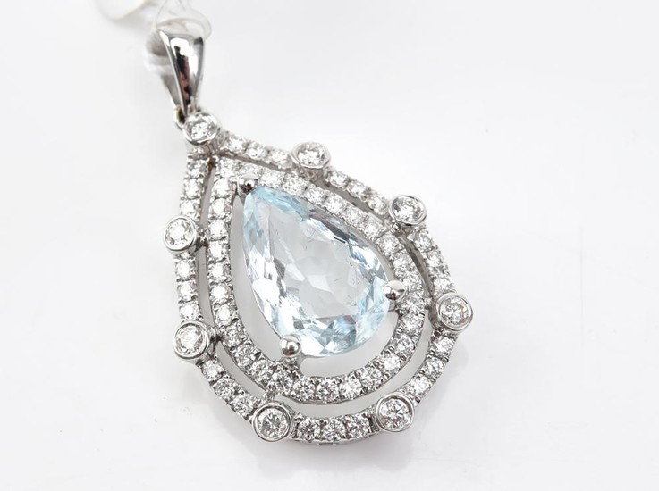 AN AQUAMARINE AND DIAMOND PENDANT - Featuring a pear brilliant cut aquamarine weighing 1.83ct, surrounded by a double border set wit...