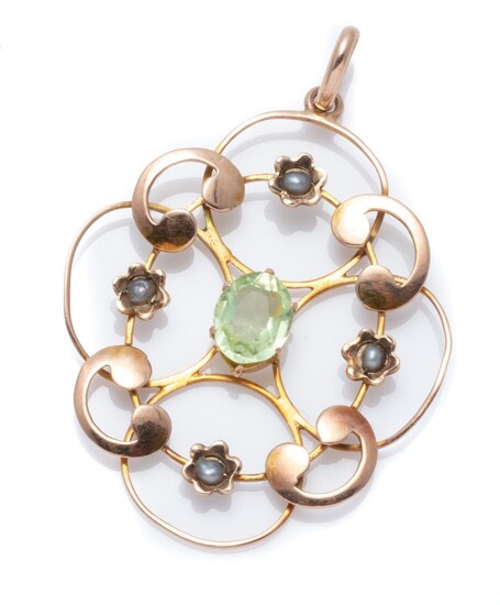 AN EDWARDIAN 9CT ROSE GOLD STONE SET PENDANT; open scrolling frame centring an oval cut green paste to surround of 4 seed pearl set...