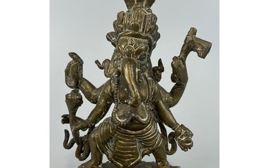 AN INDIAN BRONZE FIGURE OF GANESH PROBABLY 17TH OR 18TH CENT...