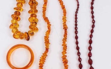 Amber bead necklace, one other necklace, vintage simulated cherry amber faceted bead necklace and three bracelets