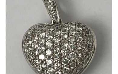 An 18ct gold and diamond heart shaped pendant