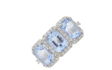 An 18ct gold aquamarine and diamond dress ring
