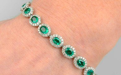 An 18ct gold emerald and diamond cluster link bracelet.