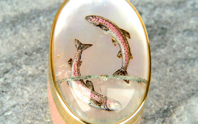 An 18ct gold pink guilloche enamel pill box, with reverse carved and painted rock crystal lid designed as rainbow trout leaping out of the water.