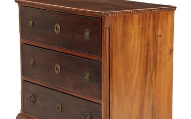 An 18th century Louis XVI mahogany chest of drawers, carved with fluted...