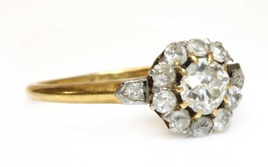 An Edwardian gold diamond cluster ring