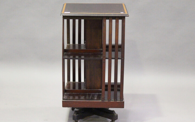 An Edwardian mahogany revolving bookcase with satinwood crossbanding, height 85cm, width 48cm, depth