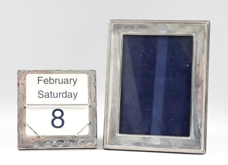 An Elizabeth II Silver Square Desk Calendar and a...