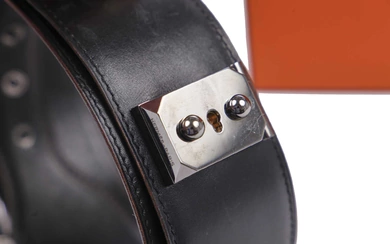 An Hermès black leather belt with metal 'lock' clasp, modern