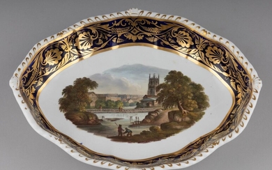 An early 19th century Derby porcelain oval dish painted with a named view "Near Derby", Length: 11 1/2 in. (29.21 cm.)