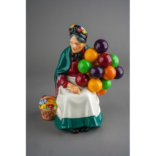 An early 20th Century Royal Doulton figure of The Old Balloo...