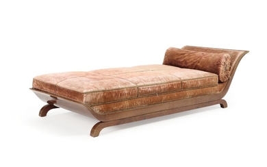 An early 20th century Art Deco daybed with mahogany frame, curved headboard. L. 225 cm.