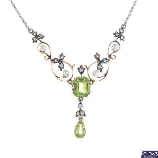 An early 20th century silver and gold, peridot, single-cut diamond and seed pearl necklace.