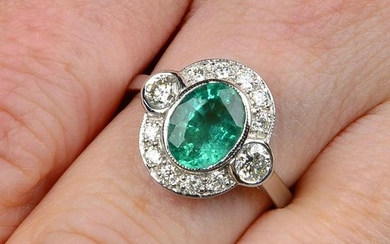 An emerald and brilliant-cut diamond cluster