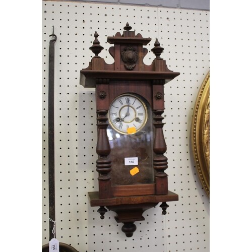 Antique French walnut wall clock, has key and pendulum (in o...