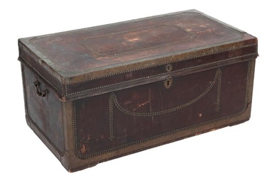BRASS-BOUND LEATHER-COVERED CAMPHORWOOD TRUNK 19th Century Height 18.25". Width 39". Depth 18".