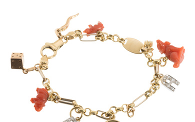 Bracelet in gold with coral and diamond charms