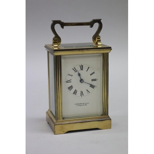 Brass cased carriage clock by Garrard of London, rectangular...
