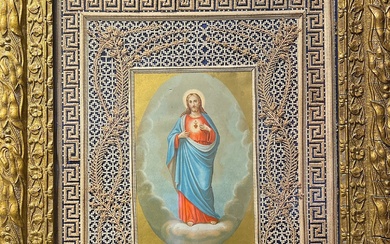 CANIVET au médaillon central représentant l'image du Christ revêtu d'une tunique rouge, enveloppé d'un manteau...