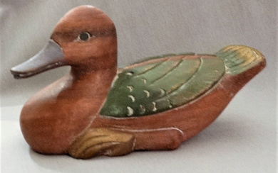 CARVED WOODEN DUCK.